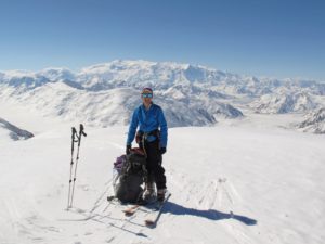 Cathy O'Dowd with Mount Logan in the distance.